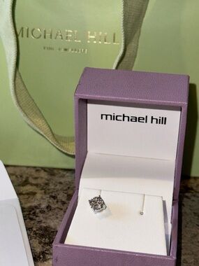 0.12 Carat TW of Diamonds in 10kt White Gold Solitaire Stud Earring